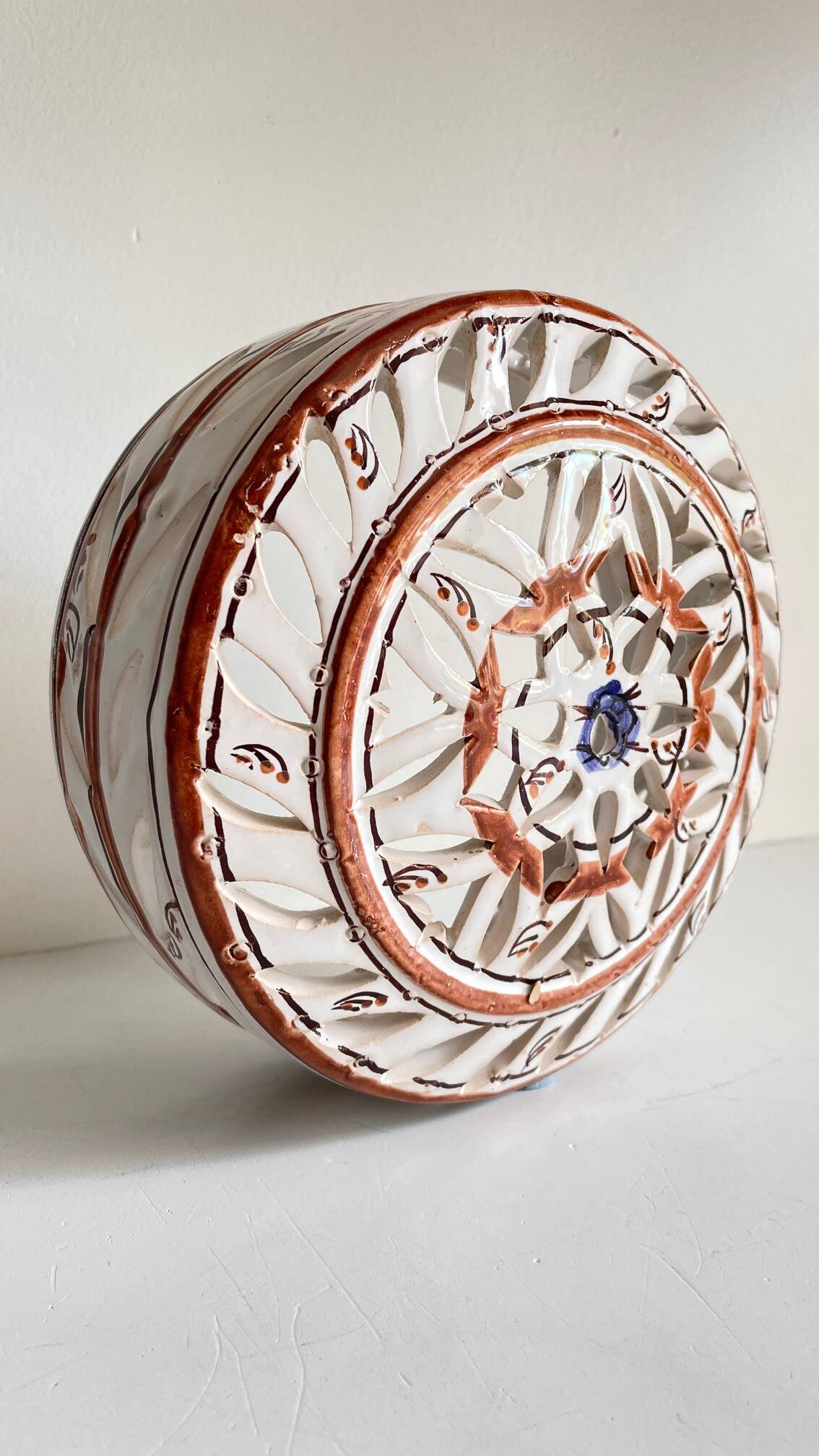 Handcrafted ceramic wall light blue centre