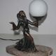 Art deco lamp in regul and marble "woman holding a globe"