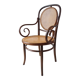 Fischel armchair seat and curved wood canned back