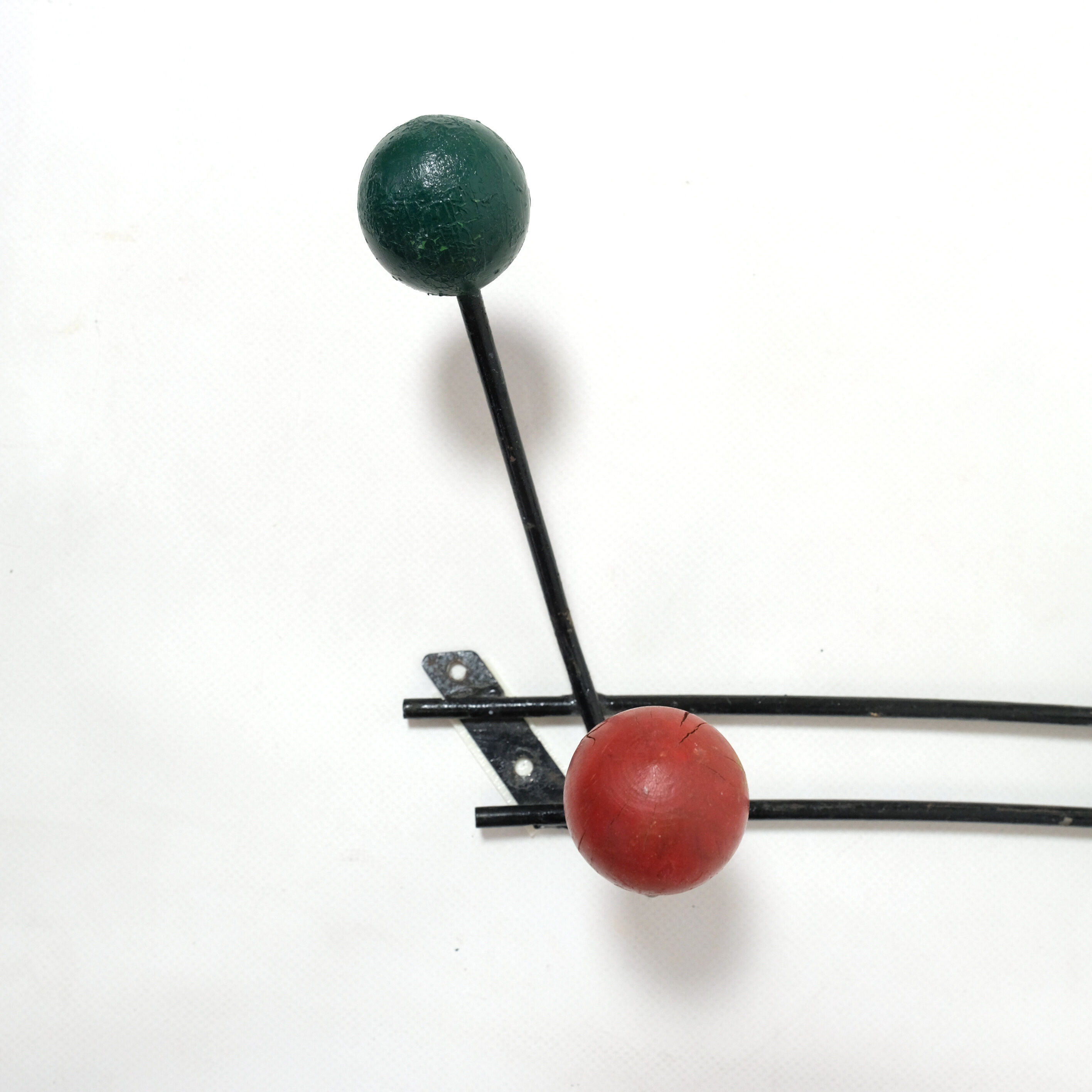 Multicolored wooden and metal coat holder