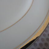 Set of 11 flat white earthenware plates with gold edging