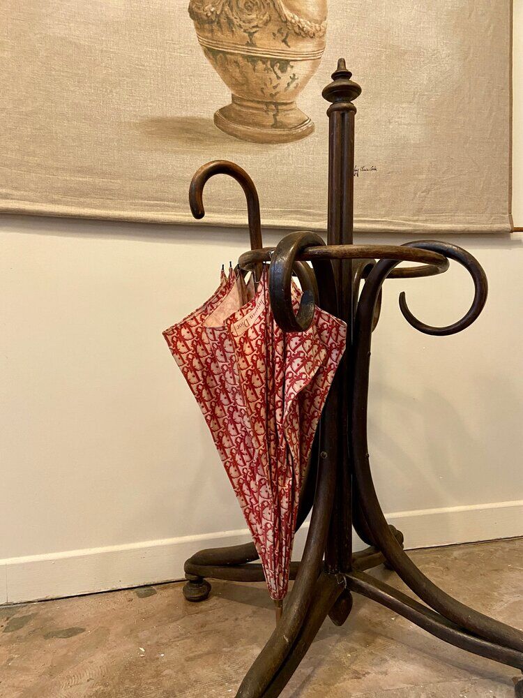 Umbrella holder in arched and dark wood