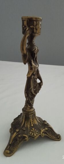 Bronze candle holder "The water carrier"