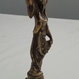 Bronze candle holder "The water carrier"