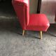 Mid-century cocktail chair in red vinyl and beech, 1950s design from Czechoslovakia.