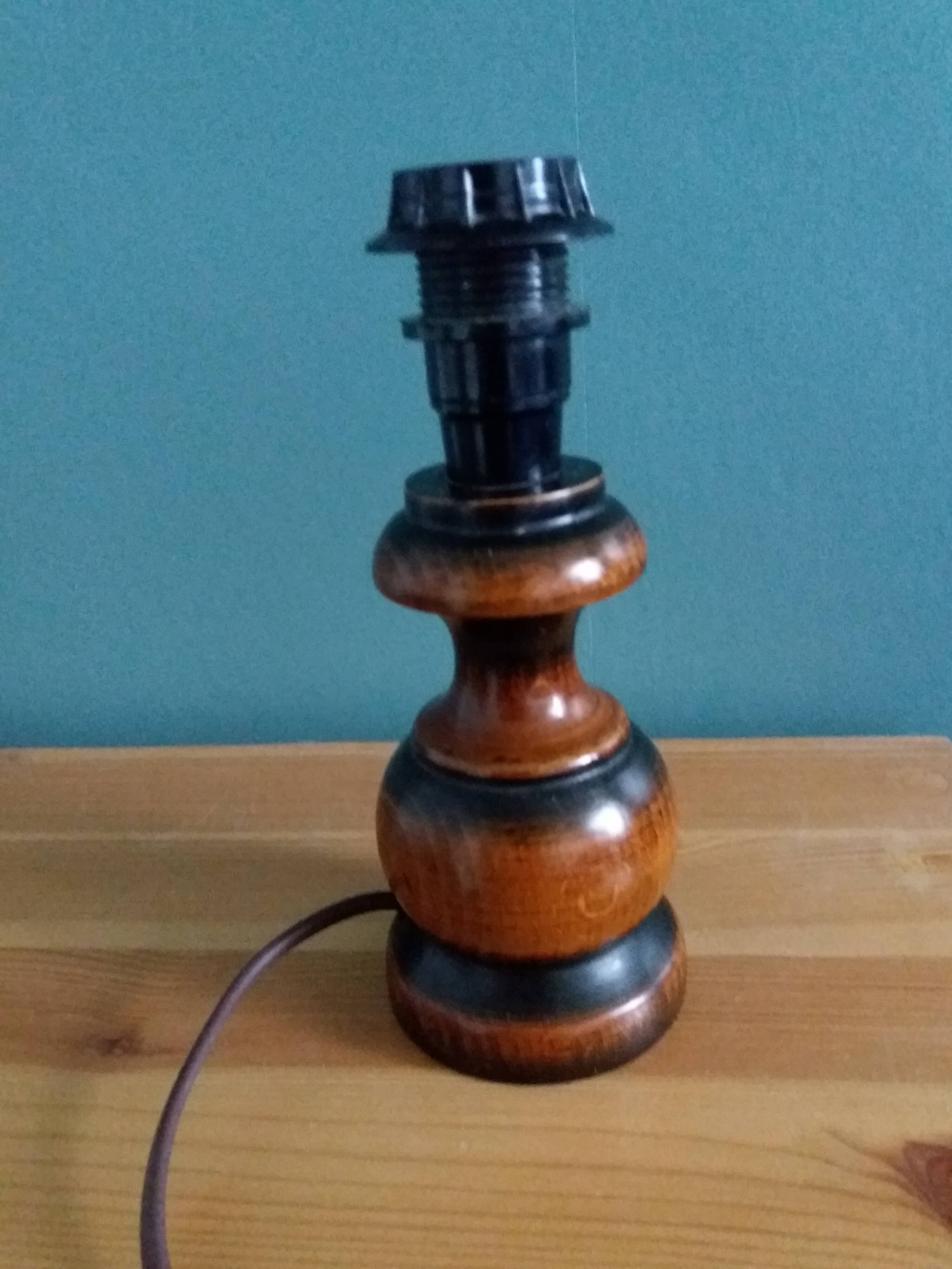 Turned wood bedside lamp with fabric lampshade