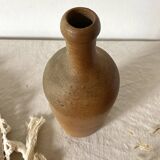 Old terracotta bottle