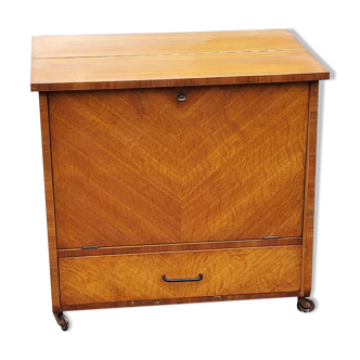 Rolling bar of the 50s in golden blond oak and multicolor formica