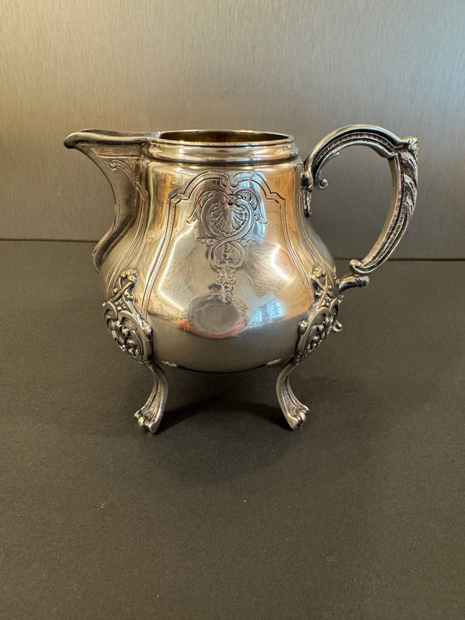 Antique silver-plated metal milk jug – Rococo style, chased decoration, early