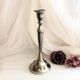 Chromed metal candle holder