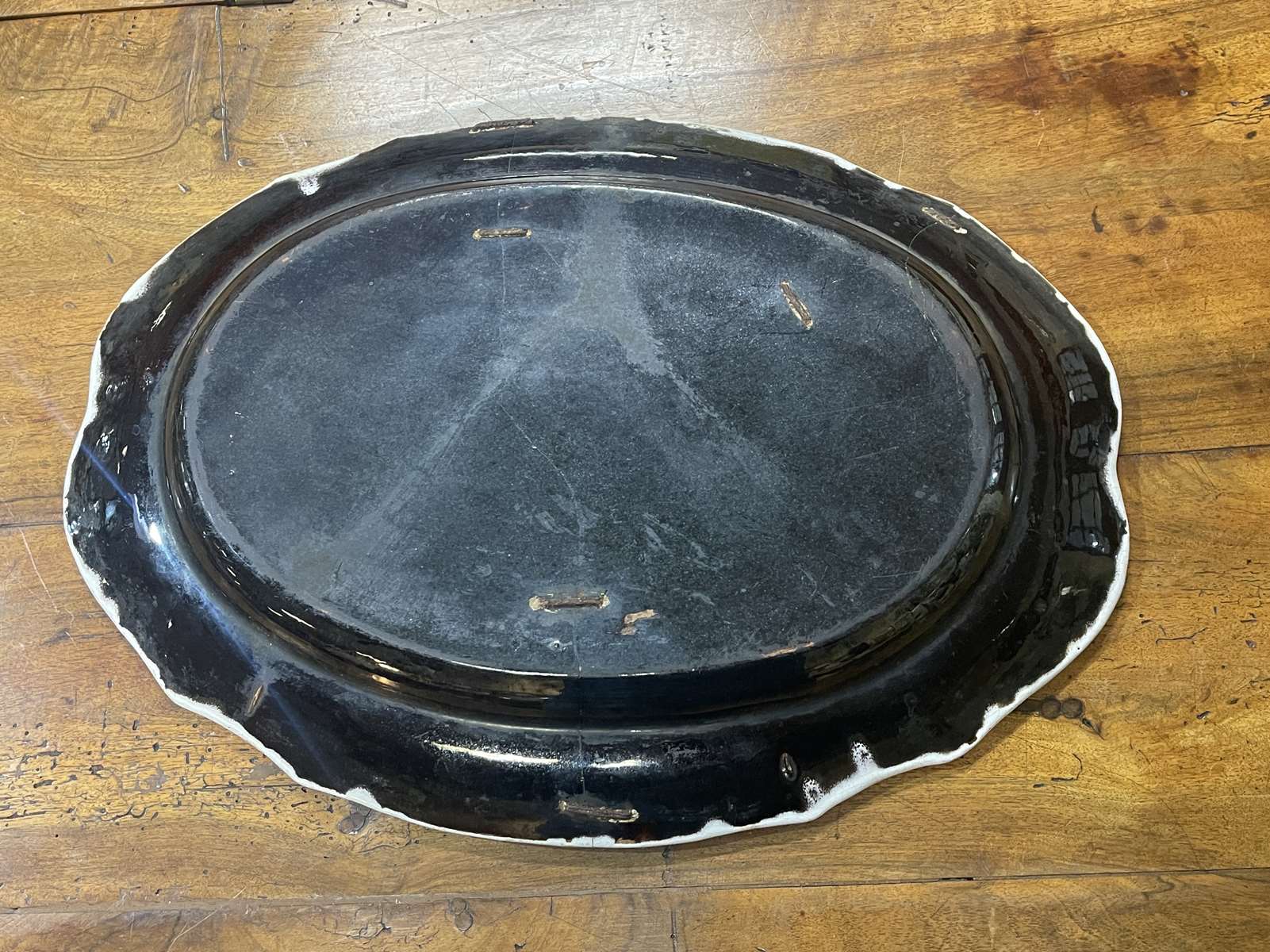 Nineteenth century faience dish "black ass"