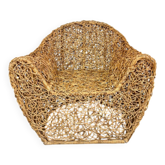 Sculptural woven rattan armchair, organic design from the 1970s.