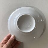 4 vintage porcelain saucers