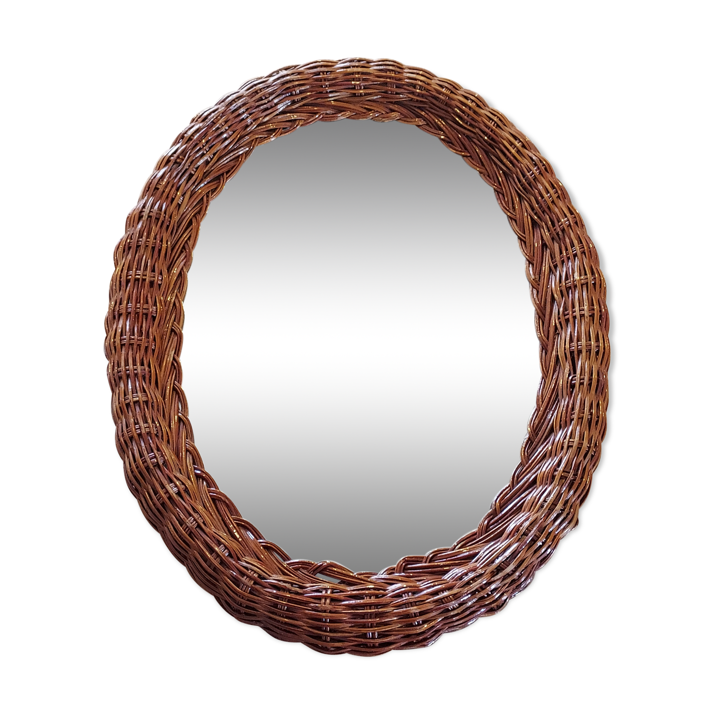 Oval mirror in dark rattan
