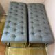 Paire de banquettes en métal chromé et tissu gris capitonné