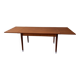 Extendable dining table in teak