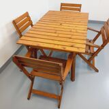 Vintage garden furniture set consisting of a table with extensions and 4 armchairs