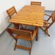 Salon de jardin vintage composé d’une table avec rallonges et 4 fauteuils