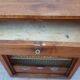 Roll-top Art Deco checkout counter with drawer
