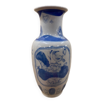 White and blue Chinese vase with vintage flower and bird patterns