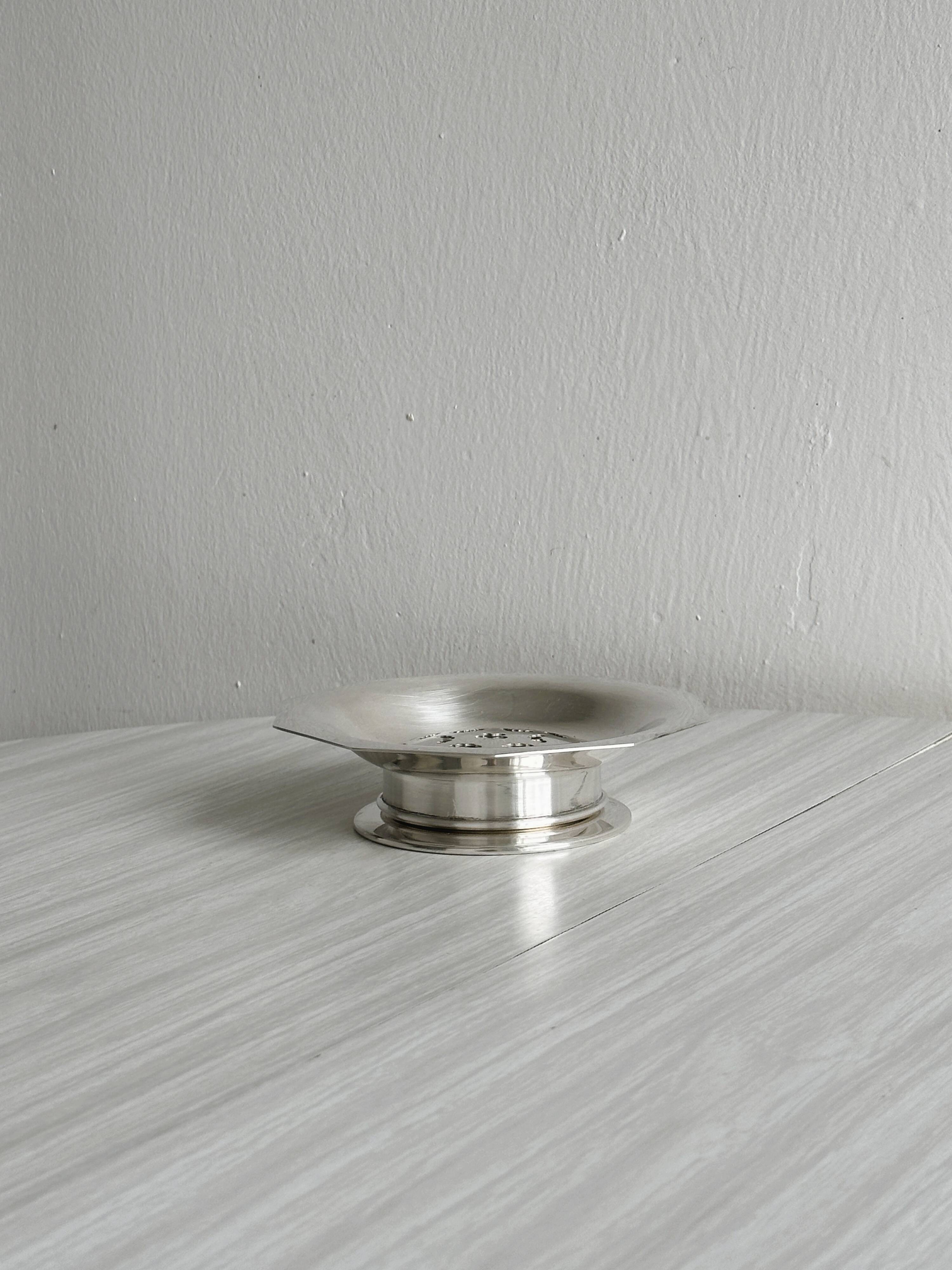 Antique shell butter dish in shiny silver metal