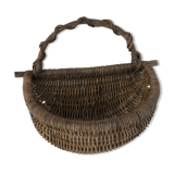 Half-moon wall basket in Wicker