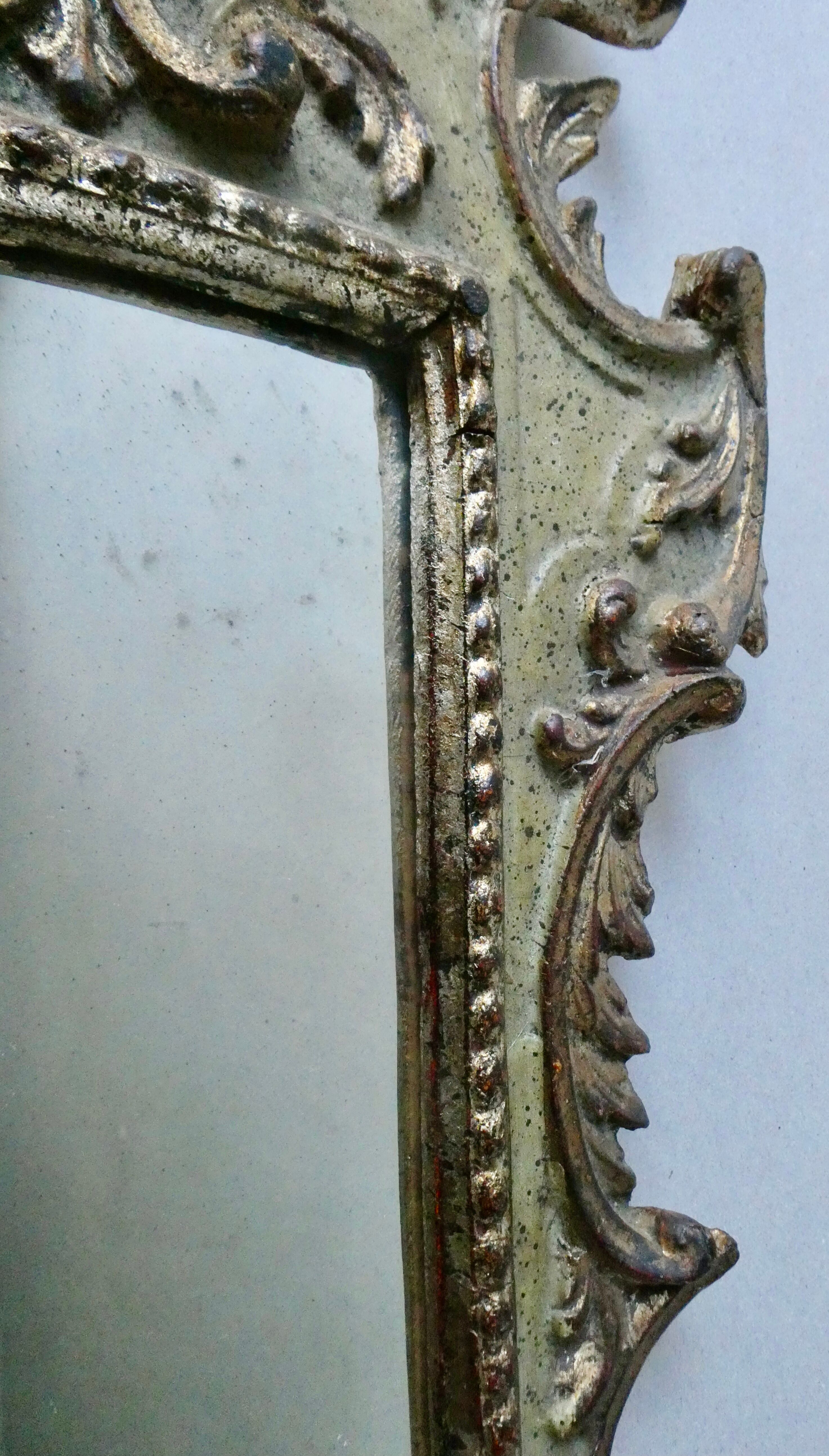 Mirror with cherub head in gilded wood, Venetian baroque style