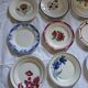 14 mismatched antique dinner plates