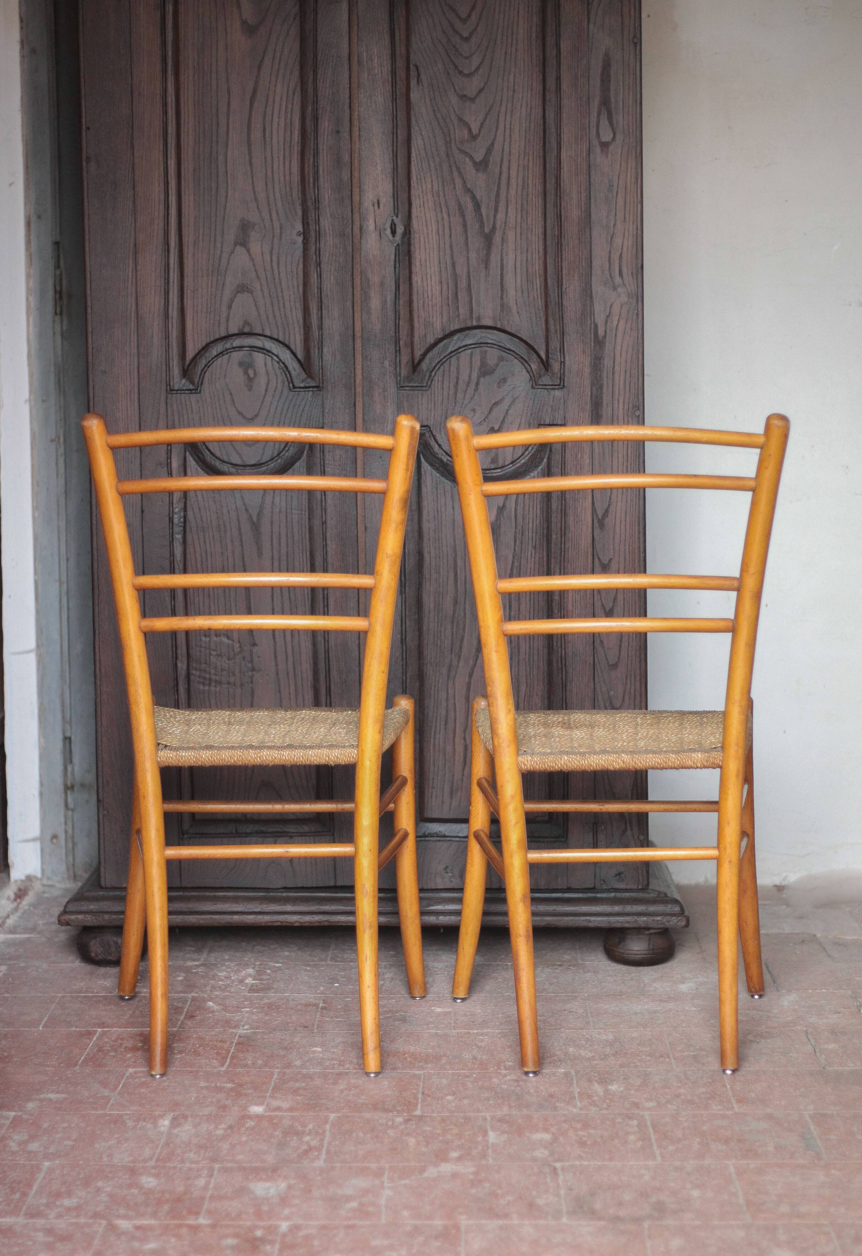 Pair of wooden chairs with vintage rope seats, vintage rope chairs