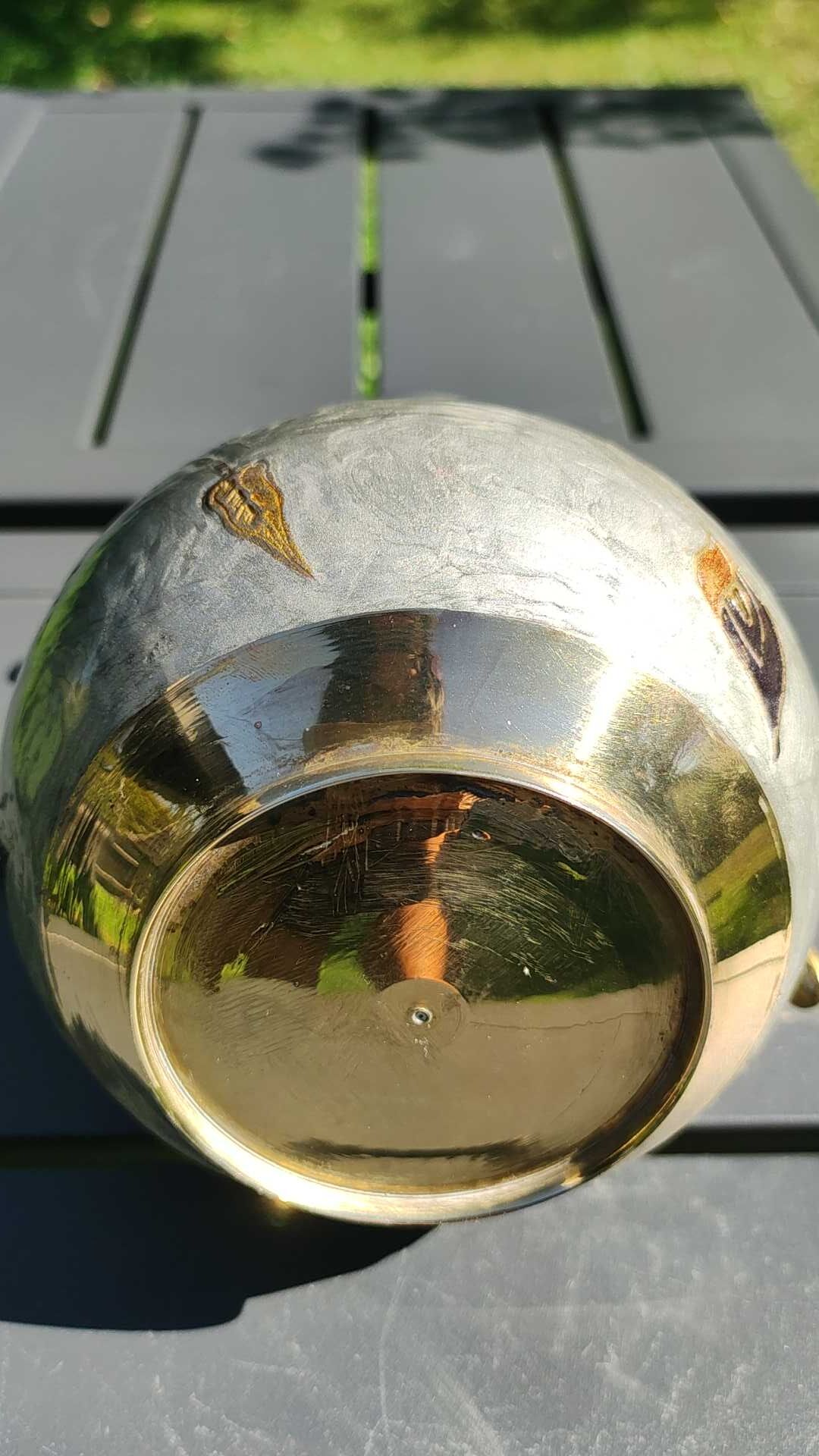 Decorative decanter in solid enamelled brass