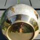 Decorative decanter in solid enamelled brass