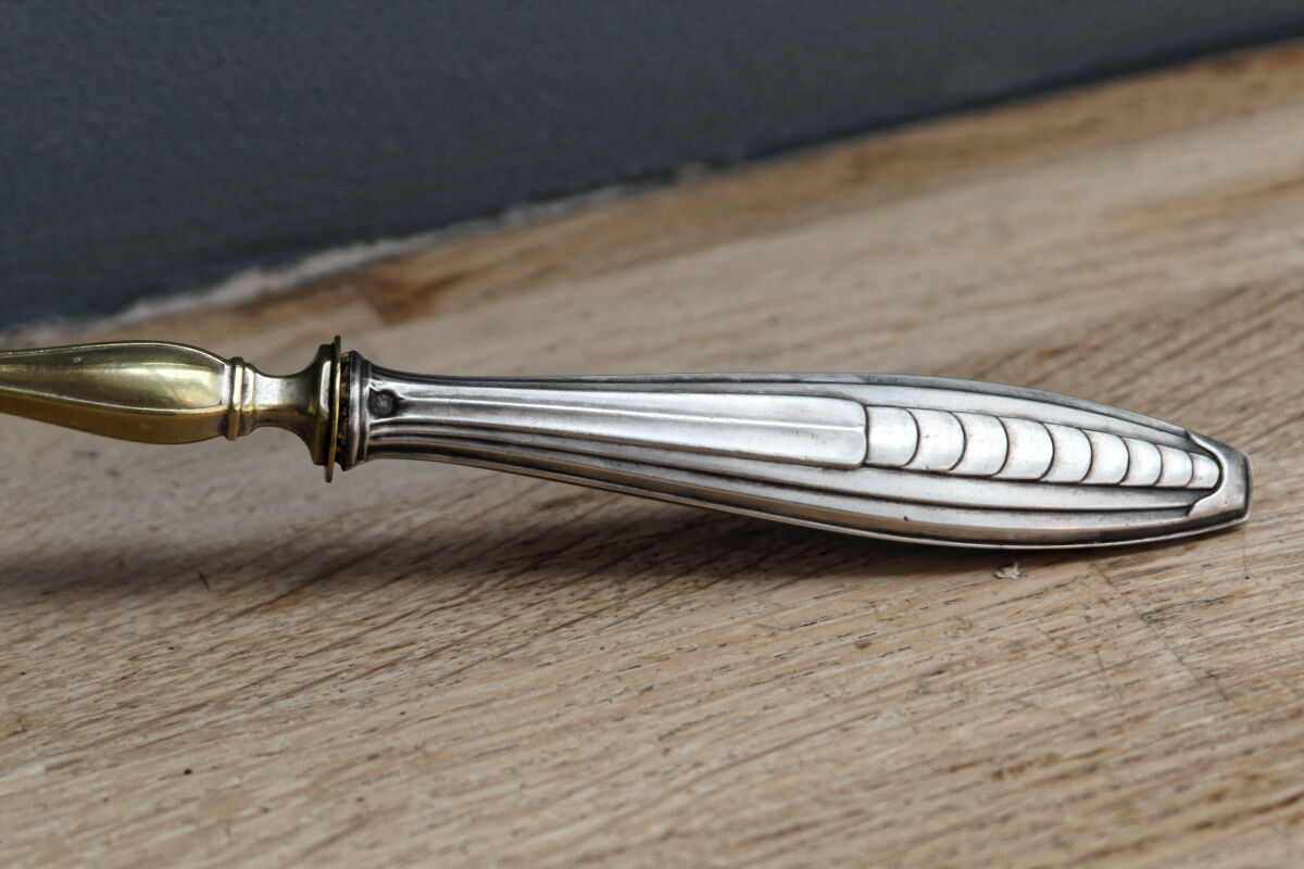 Filled silver cream ladle