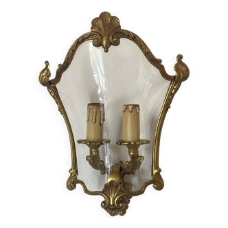 Wall lamp in Louis XV style in brass, shell decoration.