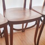 4 bistro chairs in curved wood and art nouveau patterns