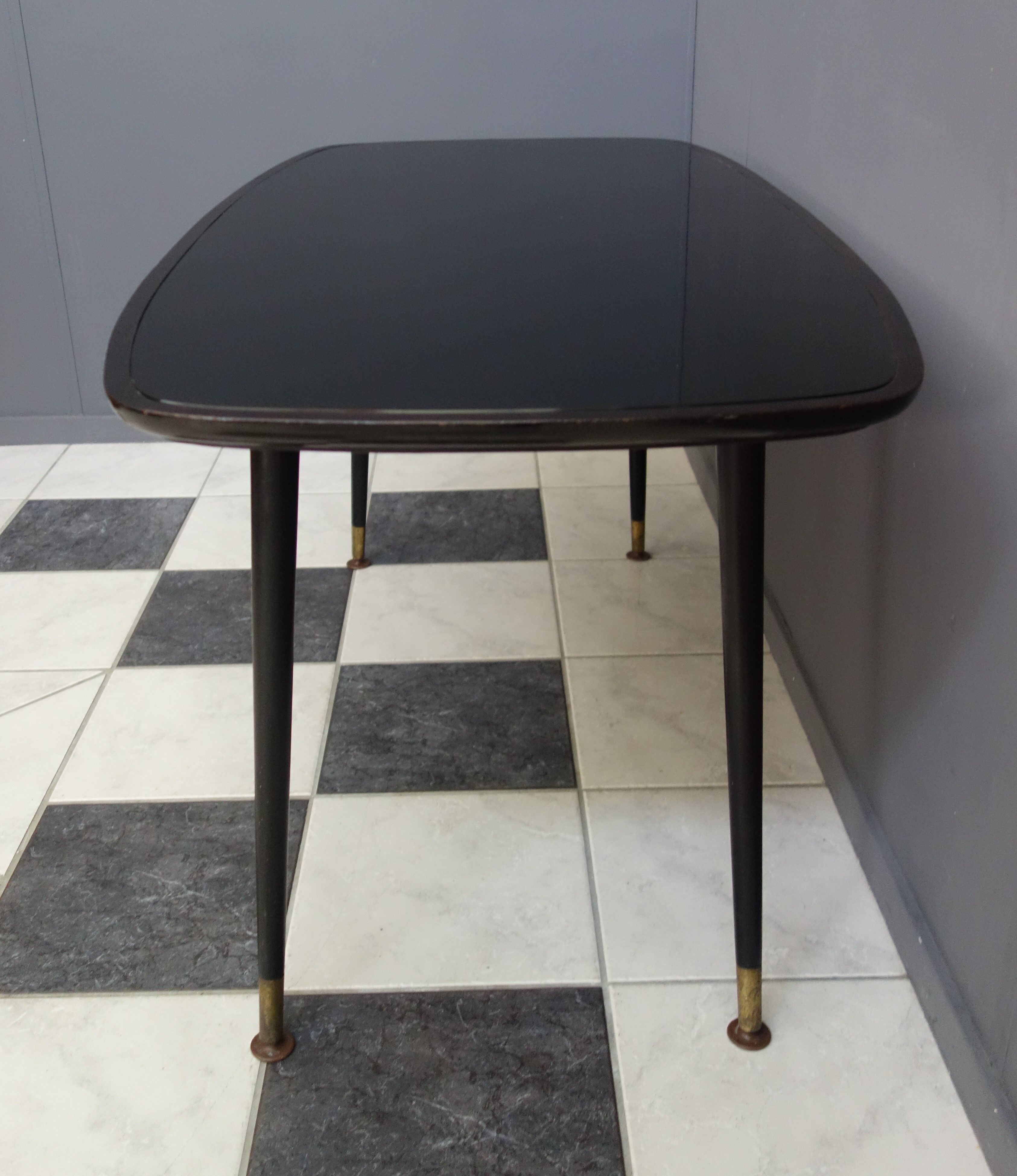Black coffee table with Black glass plate 1960s