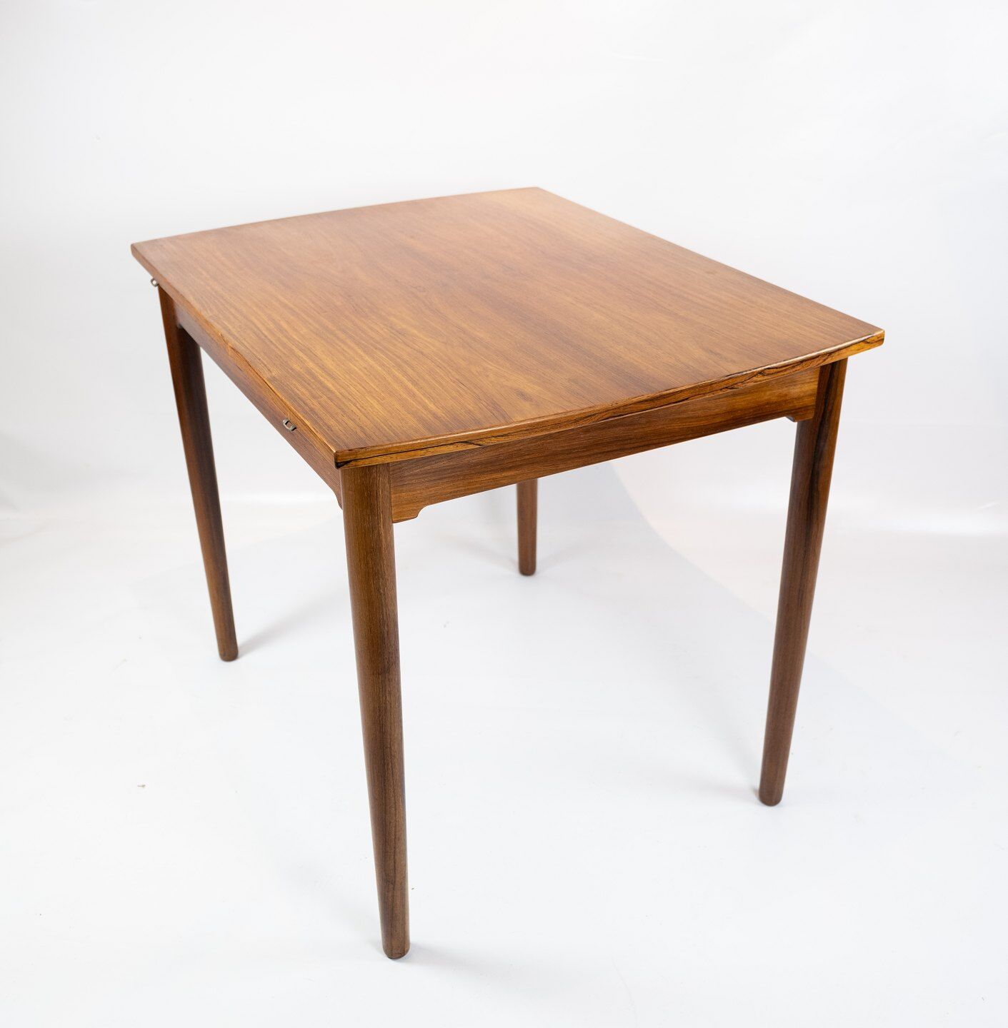 Dining table in rosewood with extentions of danish design from the 1960s