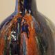 Vase en céramique émaillé multicolore signé