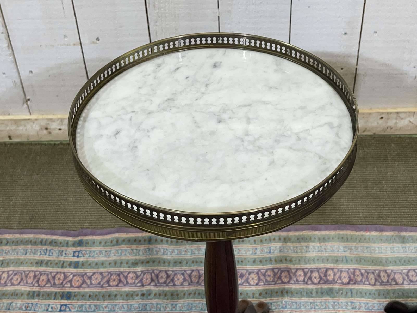 Pair of Louis XVI style mahogany side tables with marble tops