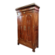 Louis Philippe period wardrobe (nineteenth) entirely covered with gilded bronzes