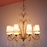 Large golden Italian chandelier with white opaline drops.