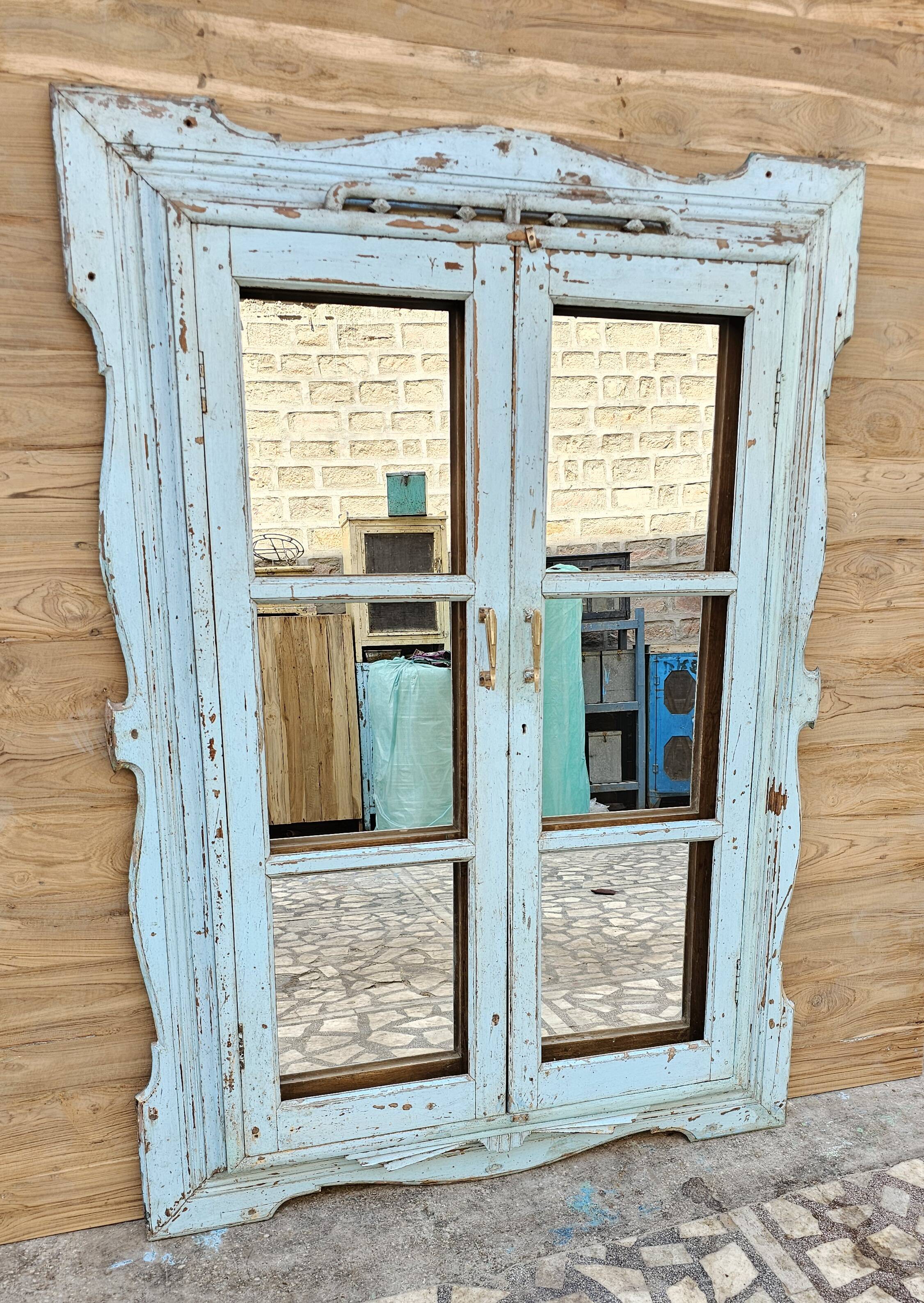 Art Deco mirror in Burmese teak