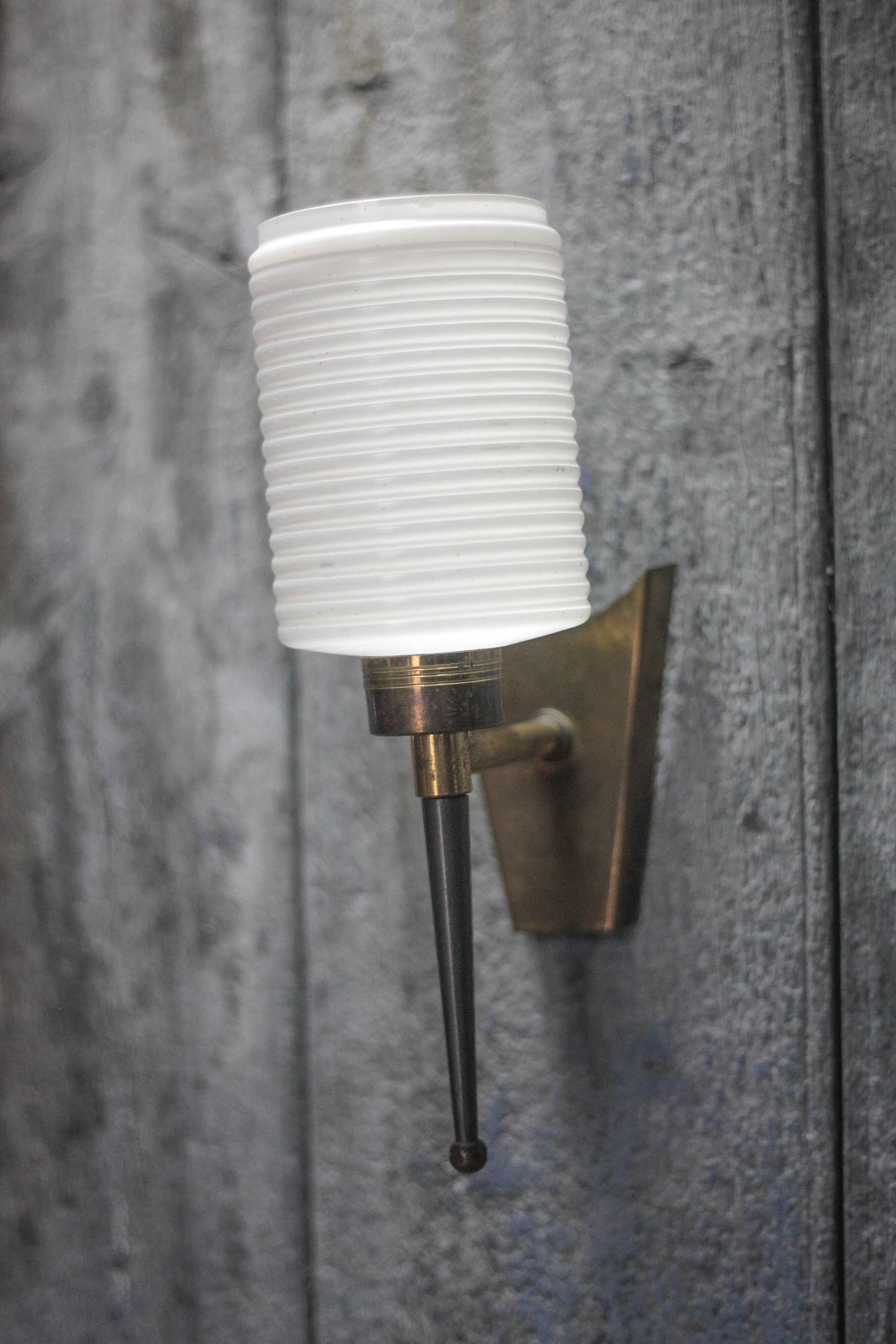 Brass wall light, black lacquered metal and white opal glass, 50s.