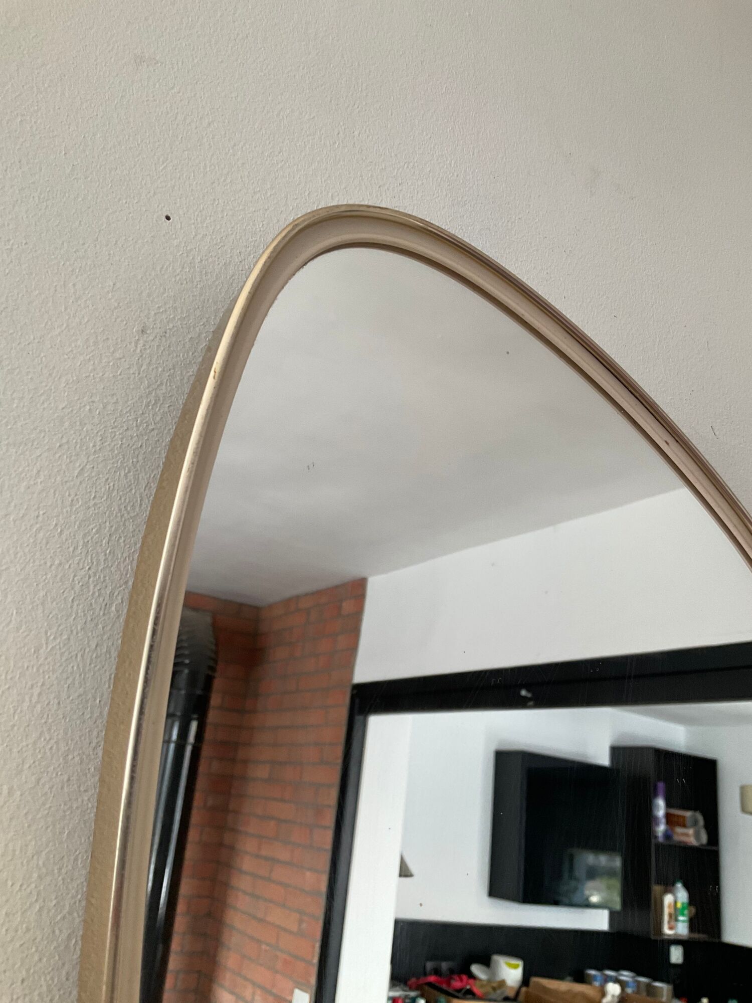 Asymmetrical mirror Deknudt freeform from the 60s-70s