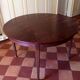 Table ronde en palissandre, extensible
