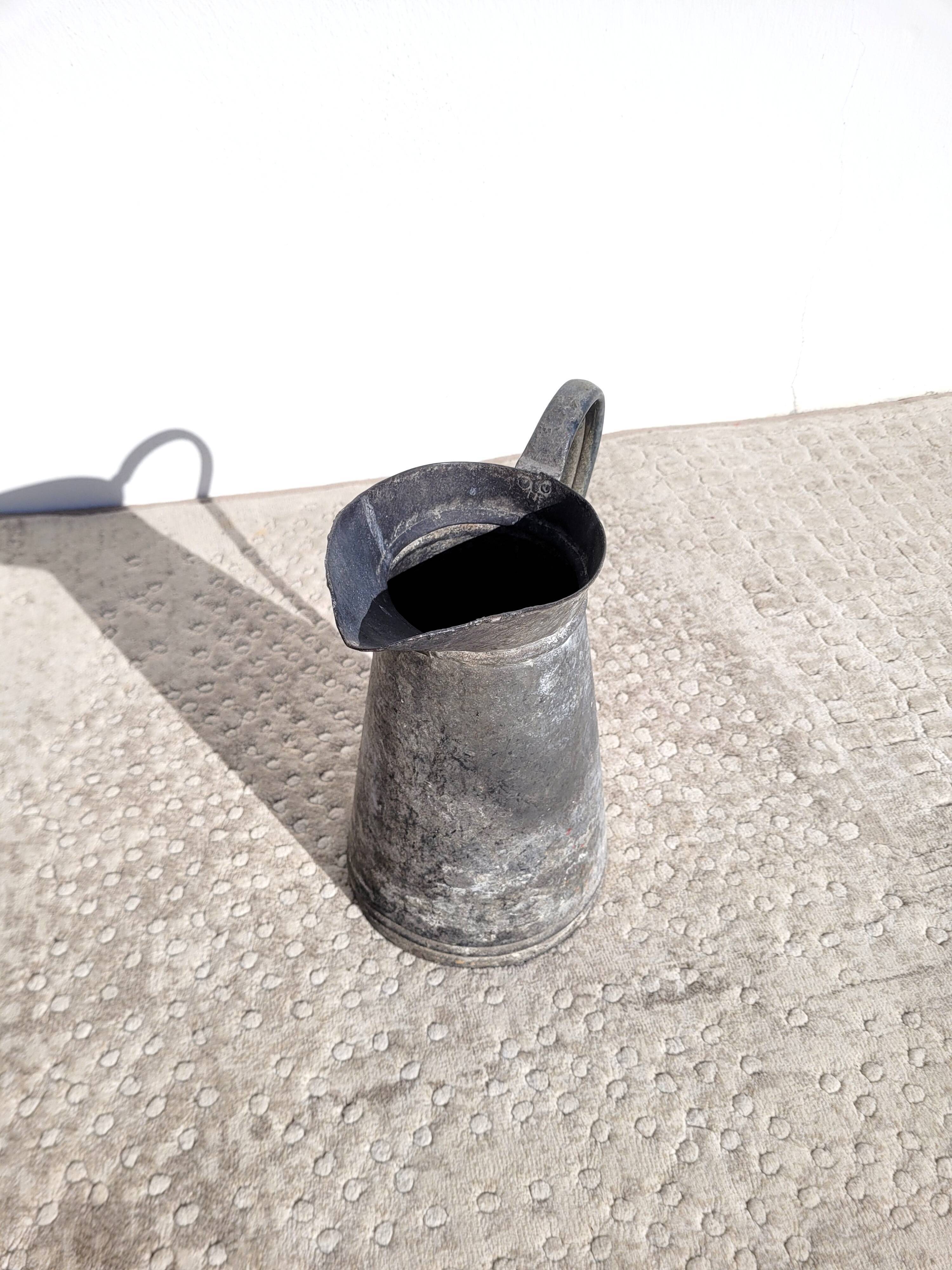 Old vintage zinc pitcher