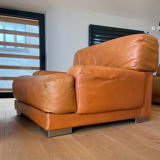 Pair of vintage armchairs Gérard Guermonprez tawny leather and stainless steel, France 1970