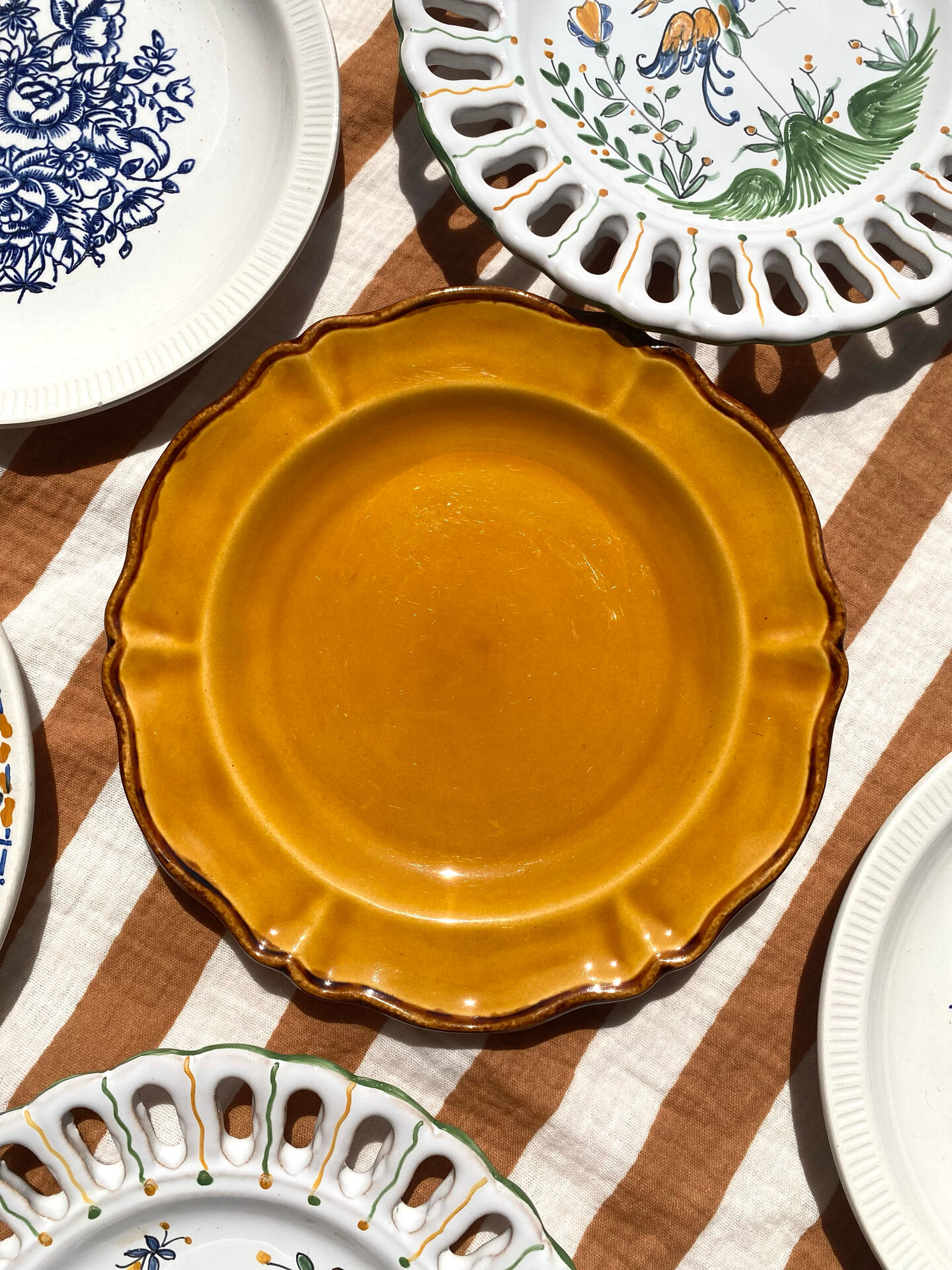 Set of twelve mismatched vintage dessert plates.