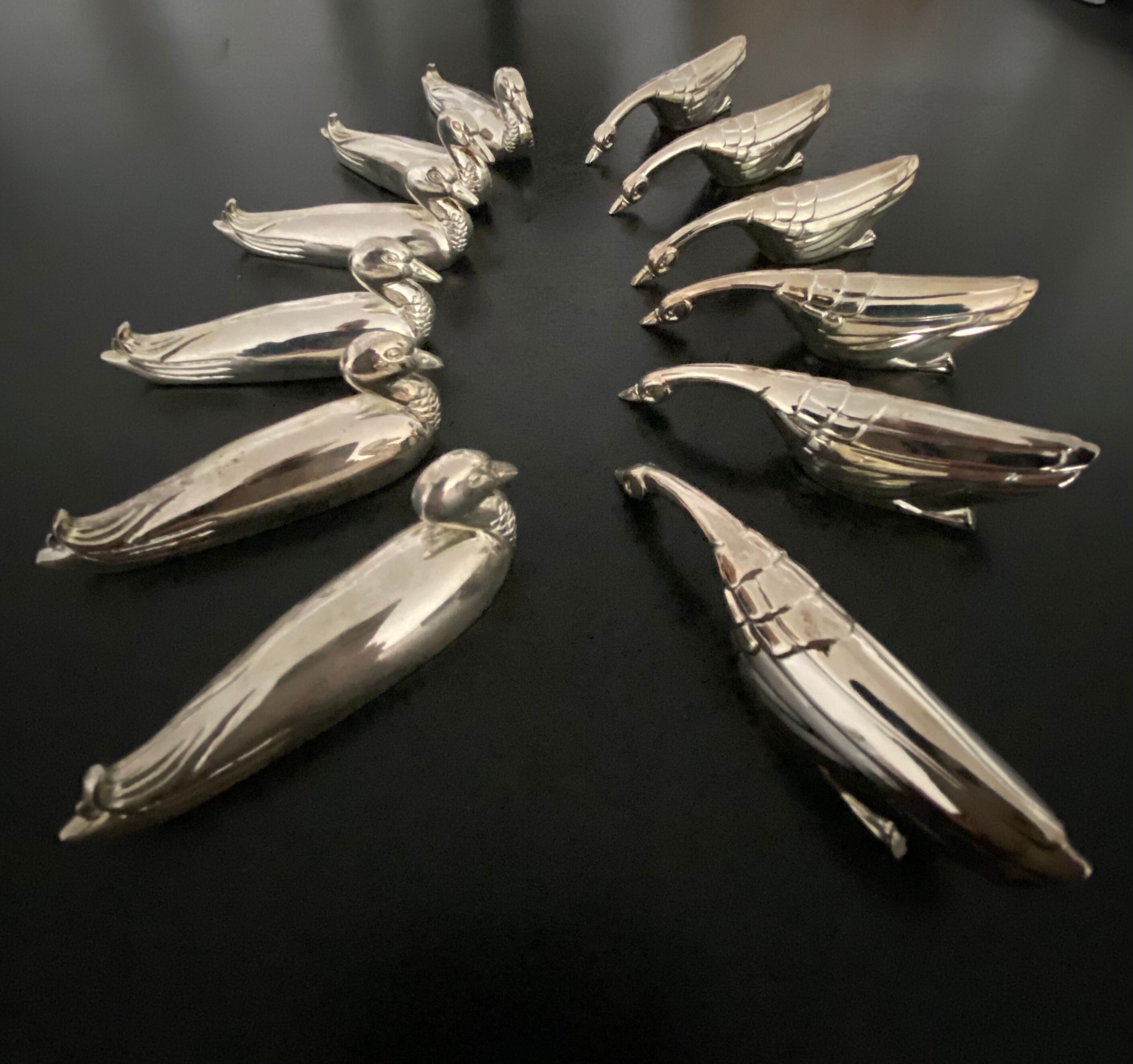 12 porte-couteaux forme canards et oies en metal