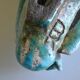 Surreal ceramic sculpture in relief signed to be identified.
