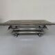 Space coffee table from the 70s, tubular metal and glass, Italian design